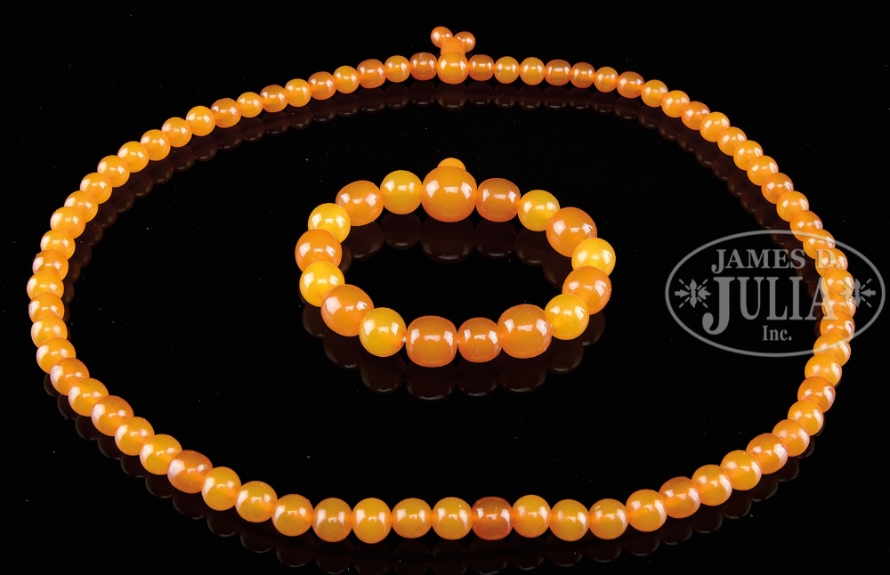 AMBER ROSARY AND NECKLACE. 20th century, China. SIZE: Largest bead: 3/8" dia. 3" across. Rosary: