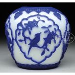 PEKING GLASS JAR. 19th century, China. Cameo glass blue cut to white. Decoration of reserves of