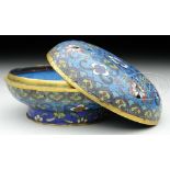 ROUND CLOISSONE BOX. 19th century, China. Decoration of stylized floral scrolling on a dark