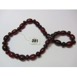 AMBER, graduated cherry amber bead necklace, total weight 74 grams