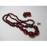 AMBER NECKLACE, Cherry amber graduated bead necklace, also matching pair of earrings