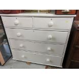 PAINTED PINE CHEST; White painted straight front chest, two short, three long drawers with wooden