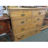 PINE CHEST; Waxed pine straight front chest of two short, three long drawers, shaped brass swan neck