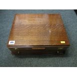 DISPLAY CASE, oak lift top cutlery box converted to a medal cabinet, Waring & Gillow label