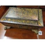 GEORGIAN LACQUER, chinoiserie design rectangular lidded box on gilded brass claw feet (requires