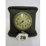 TRAVELLING CLOCK, folding leather case 8 day travelling clock, with inset presentation plaque