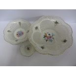 SUMI, 3 graduated porcelain ozier design baskets decorated with floral centres