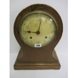 MANTEL CLOCK, inlaid oak balloon shaped mantel clock with coiled bar strike by Newhaven