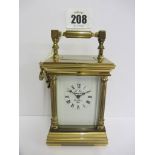 MINIATURE CARRIAGE CLOCK, brass cased bevel glass French carriage clock and key