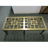 BRASS FOOTMAN, 19th Century brass rectangular 6 led footman, 30" width