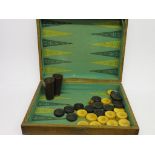 BACKGAMMON SET, oak cased backgammon set with boxwood and ebony counters