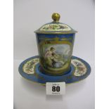 SEVRES, a gilded powder blue ground chocolate cup and cover and matching stand, reserves of 2