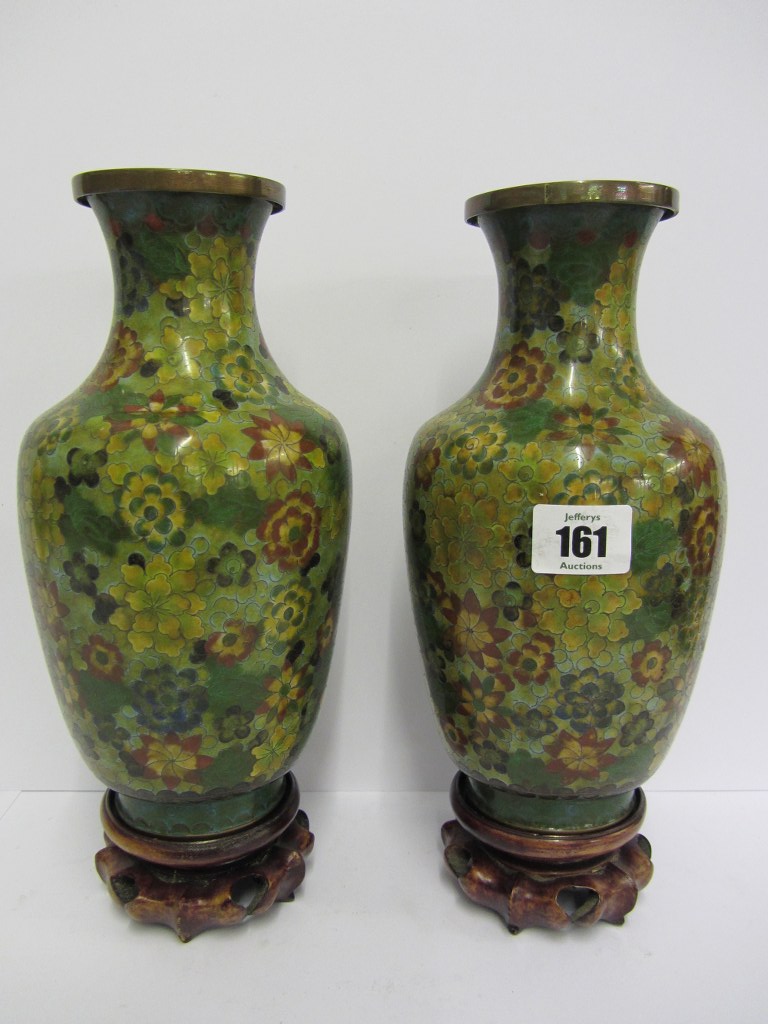 CLOISONNE, pair of Chinese floral ground 9" vases on carved stands