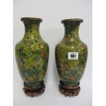 CLOISONNE, pair of Chinese floral ground 9" vases on carved stands