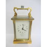 CARRIAGE CLOCK; Garrard brass case bevel glass carriage clock