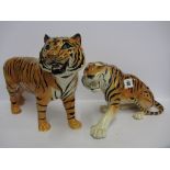 BESWICK, figure of standing tiger, together with Russain porcelain tiger