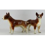 A pair of porcelain Stafforshire Bull Te