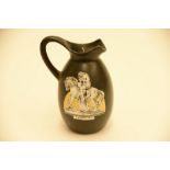 Black miniature water jug with image of