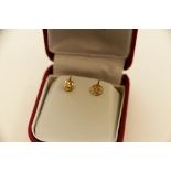 Gold dome shaped stud earrings