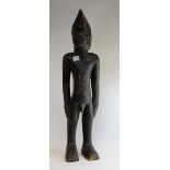 An African carved wood fertility figure