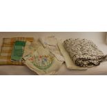 Seven tablecloths from 1920s - 1950s in