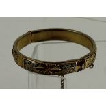 Gold plated childs bangle with enamel decoration