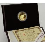 A 1993 Canadian 100 dollar gold coin with certificate