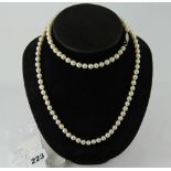 Real Pearl necklace with silver coloured claps approximately 80cm long