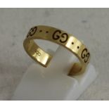 Gucci 18ct yellow ring band ring with 'GC' design. Size: M. Total weight 3.9g