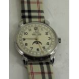 A gents omega wristwatch with moon dial aperture on burberry