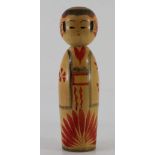 Wooden japanese doll