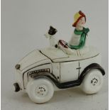 Small ceramic Art Deco car with passenger and dog