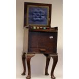 A Victorian sewing box and accessories on cabriole supports