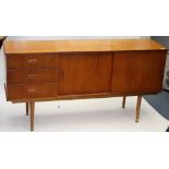 A 1960s/70's 3 section Danish style retro sideboard of small proportions