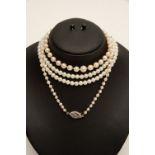 2 single string pearl necklaces