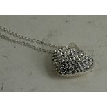 A silver and CZ heart shaped necklace