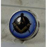 A silver and enamel pill box with Masonic motif