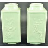 A PAIR OF EARLY 20TH CENTURY CHINESE CELADON CONG VASES, each vertical side moulded in underglaze