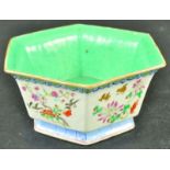 A GOOD QUALITY LATE 19TH CENTURY CHINESE FAMILLE ROSE PORCELAIN BOWL, the sides painted with