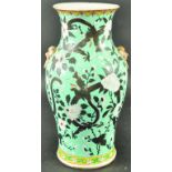 A CHINESE GUANGXU PERIOD DRAGON VASE, painted in the Empress Dowager style with dragons in black and