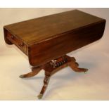 A GEORGIAN MAHOGANY PEMBROKE TABLE with folding flap, drawers either side on a centre column