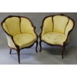 A GOOD PAIR OF LOUIS XVI DESIGN TUB ARMCHAIRS with carved show wood frames on cabriole legs.