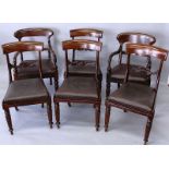A SET OF FOUR WILLIAM IV MAHOGANY DINING CHAIRS with plain top rails, carved tie bars, drop in seats