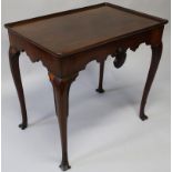 A GOOD 18th CENTURY IRISH TRAY TOP TABLE with plain rectangular top, shaped frieze, the front