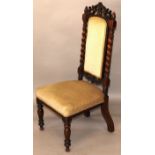 A VICTORIAN ROSEWOOD OCCASIONAL CHAIR, carved top rail, upholstered back between barley twist