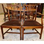 A GOOD SET OF SIX GOTHIC CHIPPENDALE MAHOGANY DINING CHAIRS, two with arms, curving top rail,