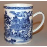 A CHINESE QIANLONG PERIOD BLUE & WHITE PORCELAIN TANKARD, the sides painted with a river landscape