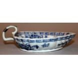 AN 18TH CENTURY CHINESE BLUE & WHITE PORCELAIN LEAF-FORM PORCELAIN SAUCEBOAT, with fluted sides, the