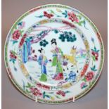 A CHINESE YONGZHENG/QIANLONG PERIOD FAMILLE ROSE PORCELAIN PLATE, circa 1730/40, painted to its