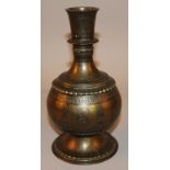 A 19TH CENTURY INDIAN BRONZE HOOKAH BASE, some of the engraved decoration with black enamel inlay,